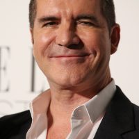 Simon Cowell Gets A Star Simon Cowell poses for photographers at the Elle Style Awards in London, Tuesday, Feb. 24, 2015. (Photo by Joel Ryan/Invision/AP)